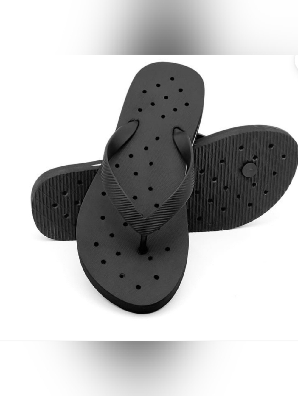 Black perforated flip flop sandals